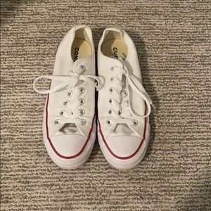 Lightly worn white converse shoes